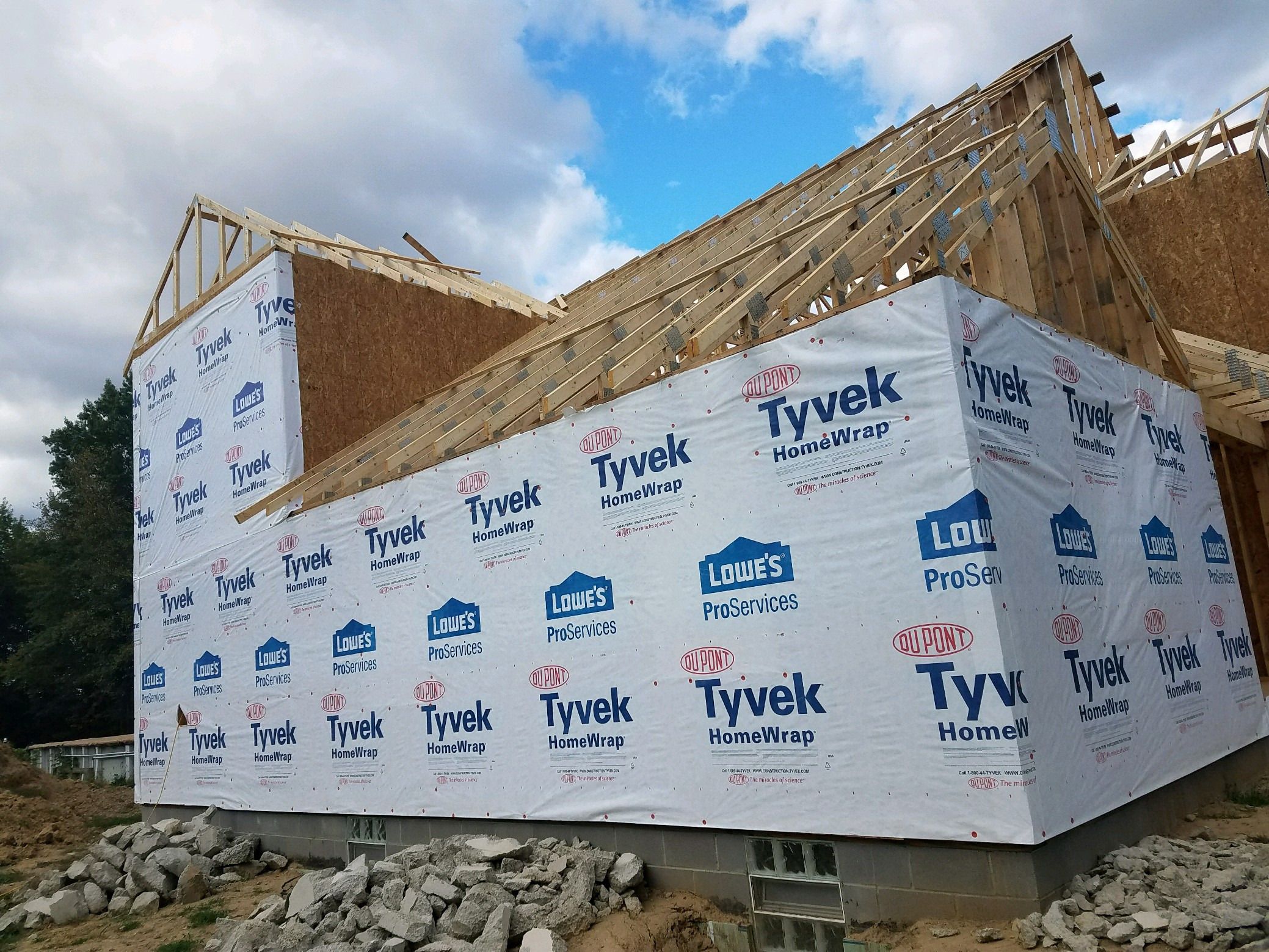 House wrapped in weather proofing underlay